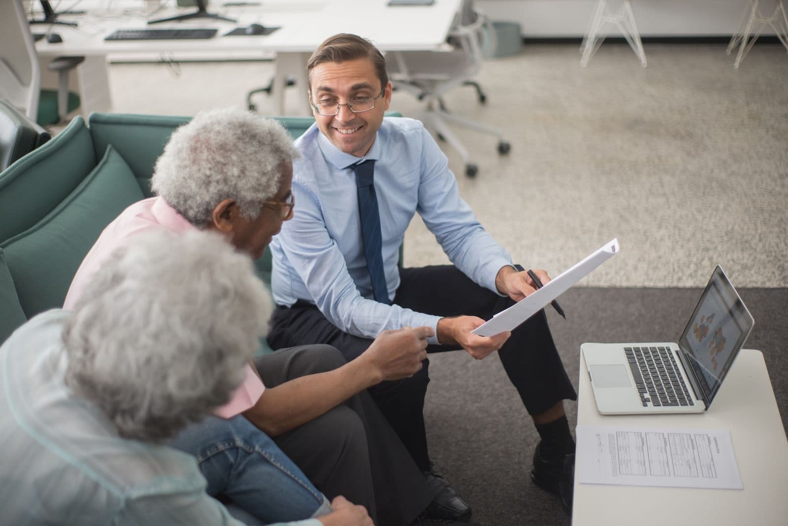 A relationship manager reviewing a personal banking account with a client