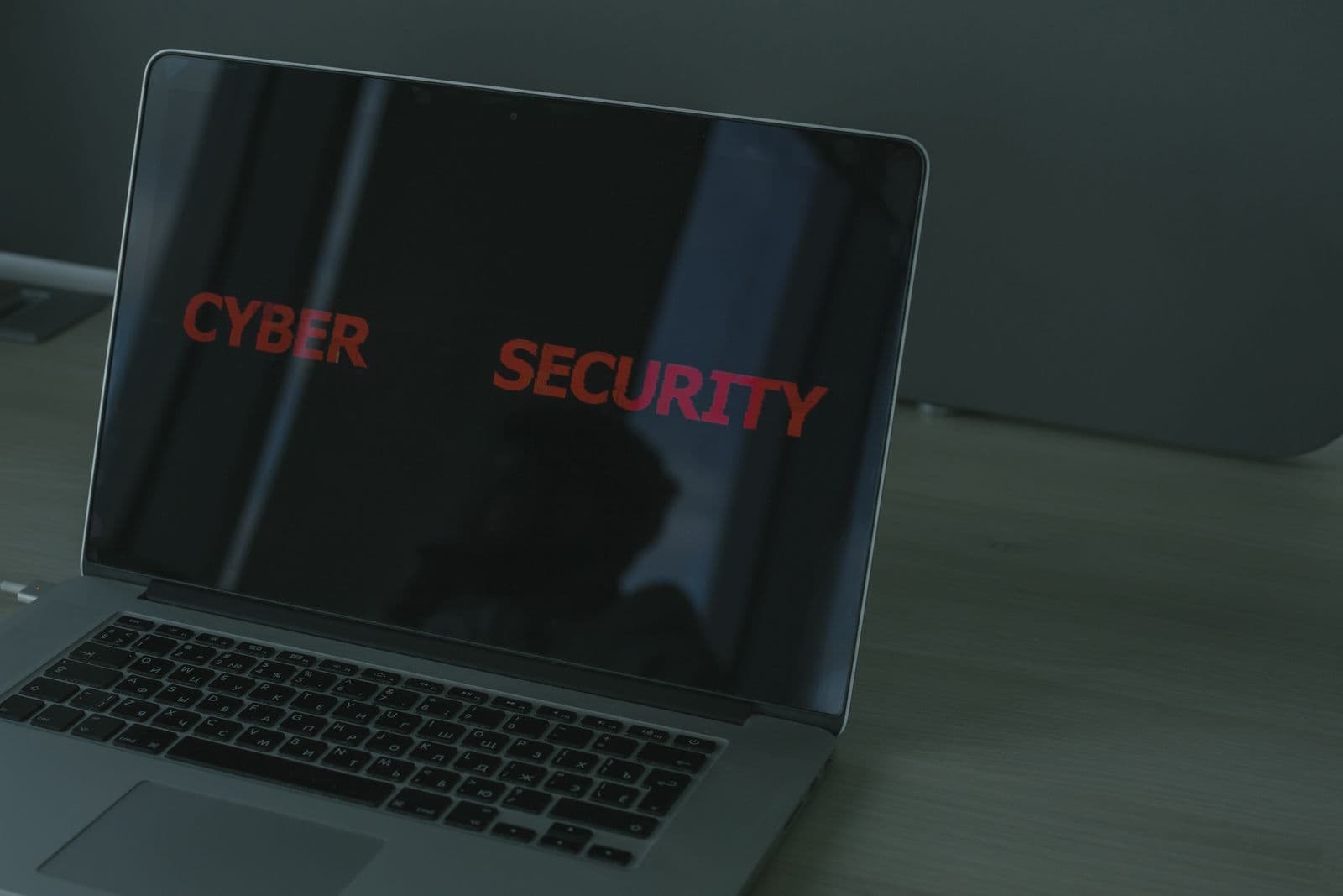 Laptop screen displaying a cyber security dashboard